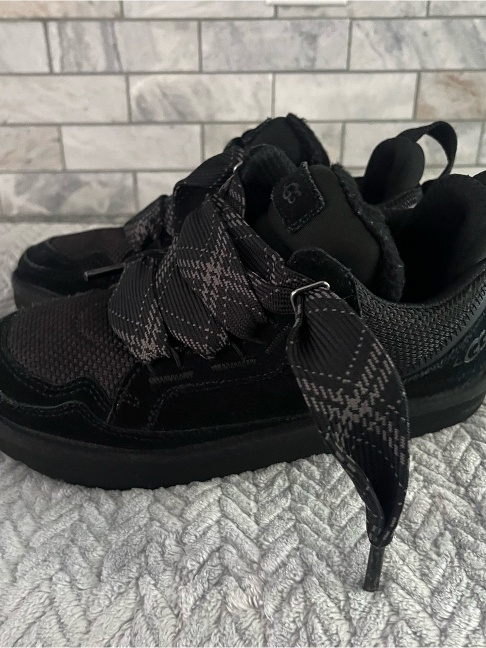 UGG Kids Black Sneakers with Patterned Ribbon Laces